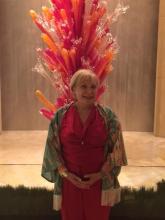 WHE in front of a favorite Chihuly glass piece